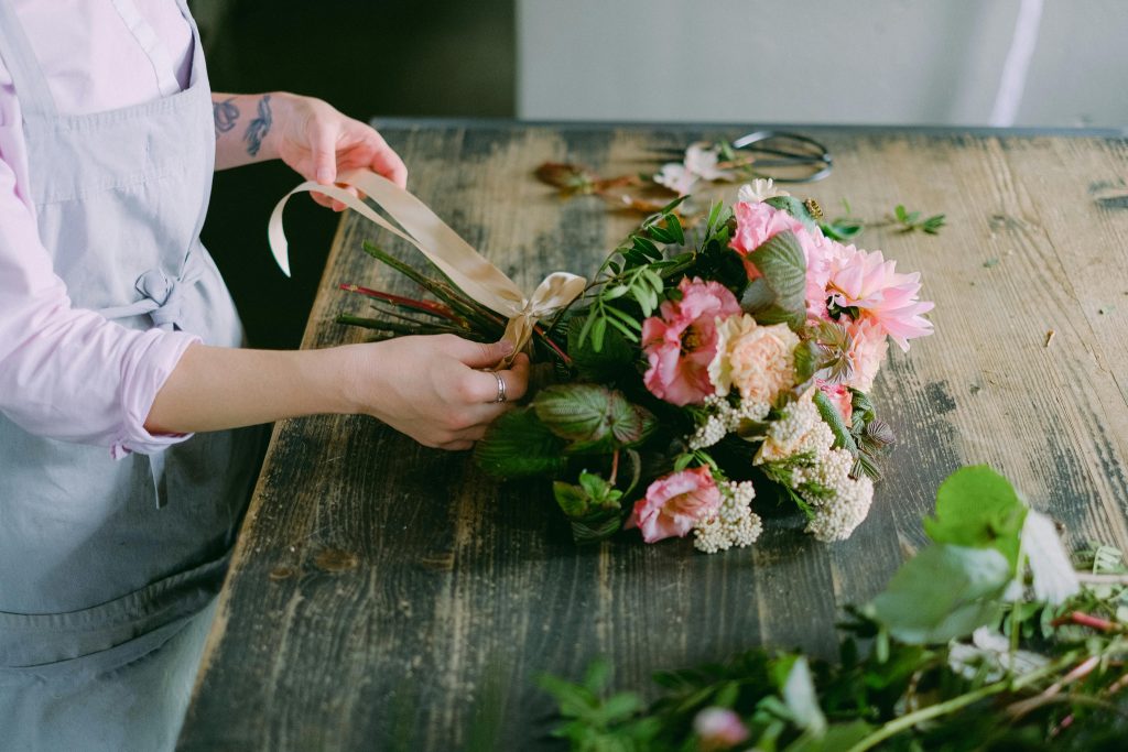 A person arranging flowers