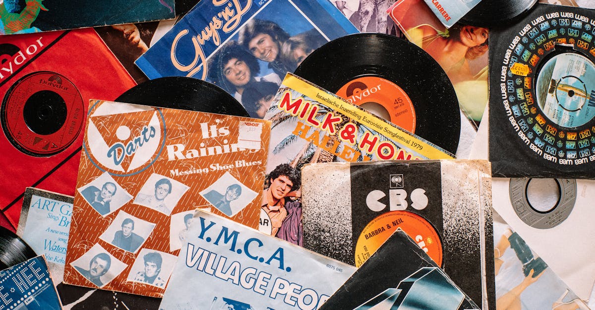 a flat lay of vintage vinyl record covers showcasing 70s and 80s music nostalgia