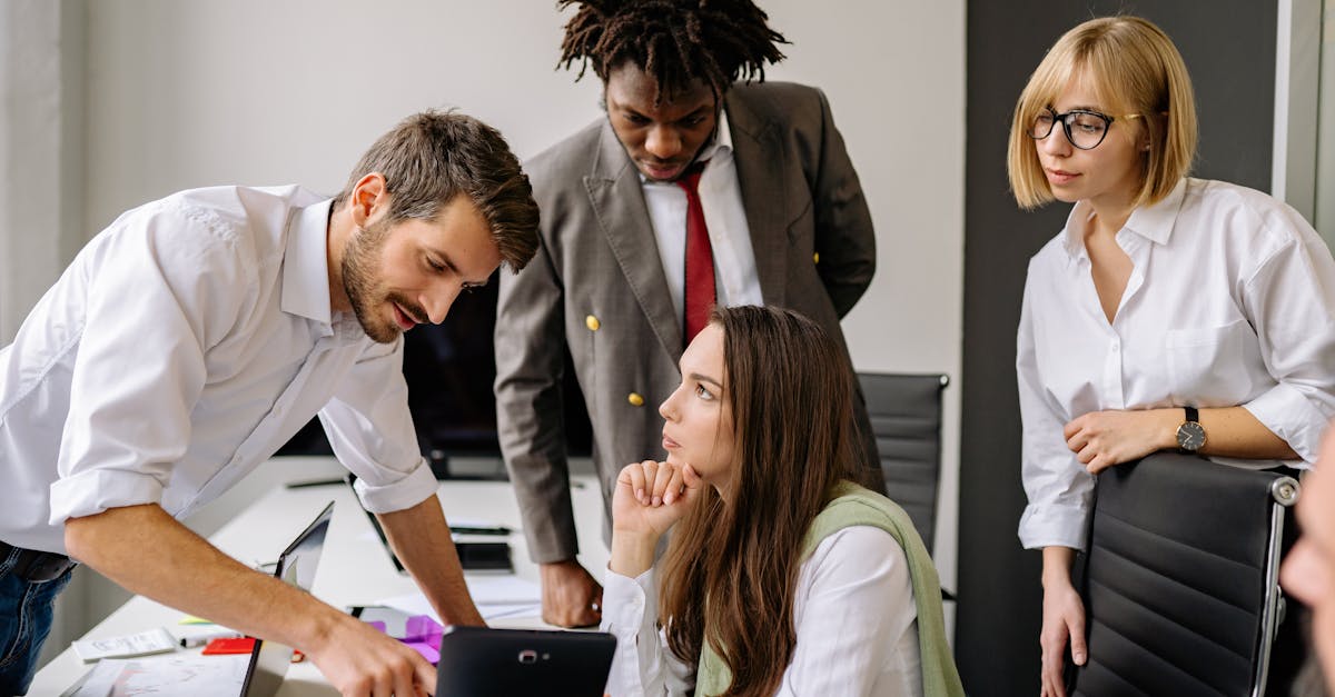 a group of professionals engaging in a collaborative business meeting in a modern office