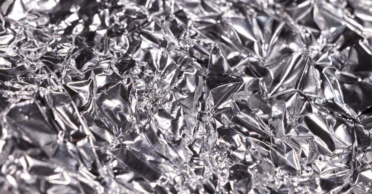 detailed macro shot of crumpled aluminum foil showcasing texture and shine