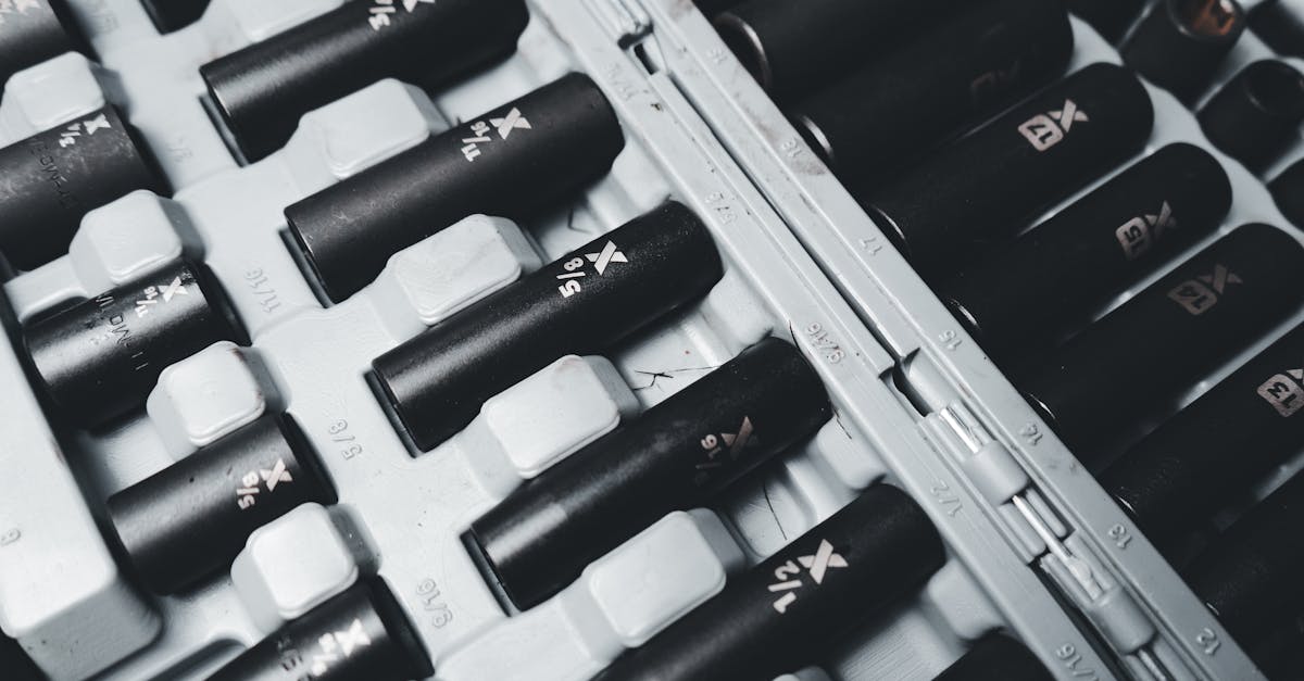 detailed view of a black and white industrial socket set neatly arranged in a