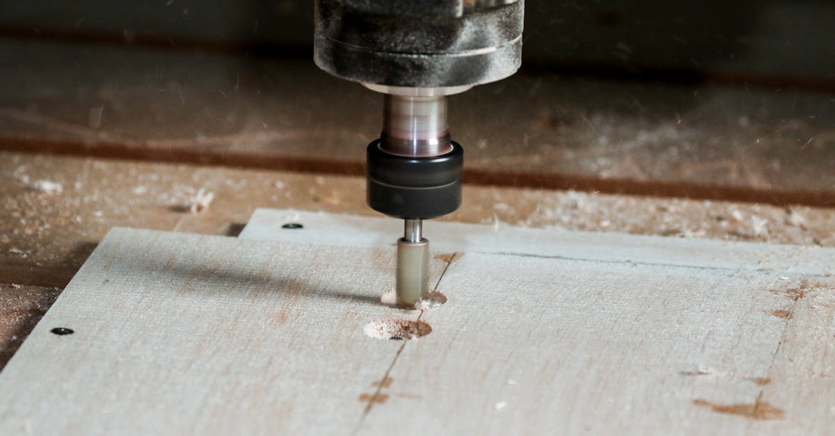 detailed view of a milling machine cutting wood in a workshop setting