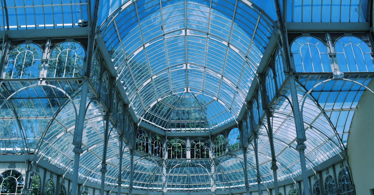 elegant architecture of the glass roofed palacio de cristal in madrid spain showcasing its intricat