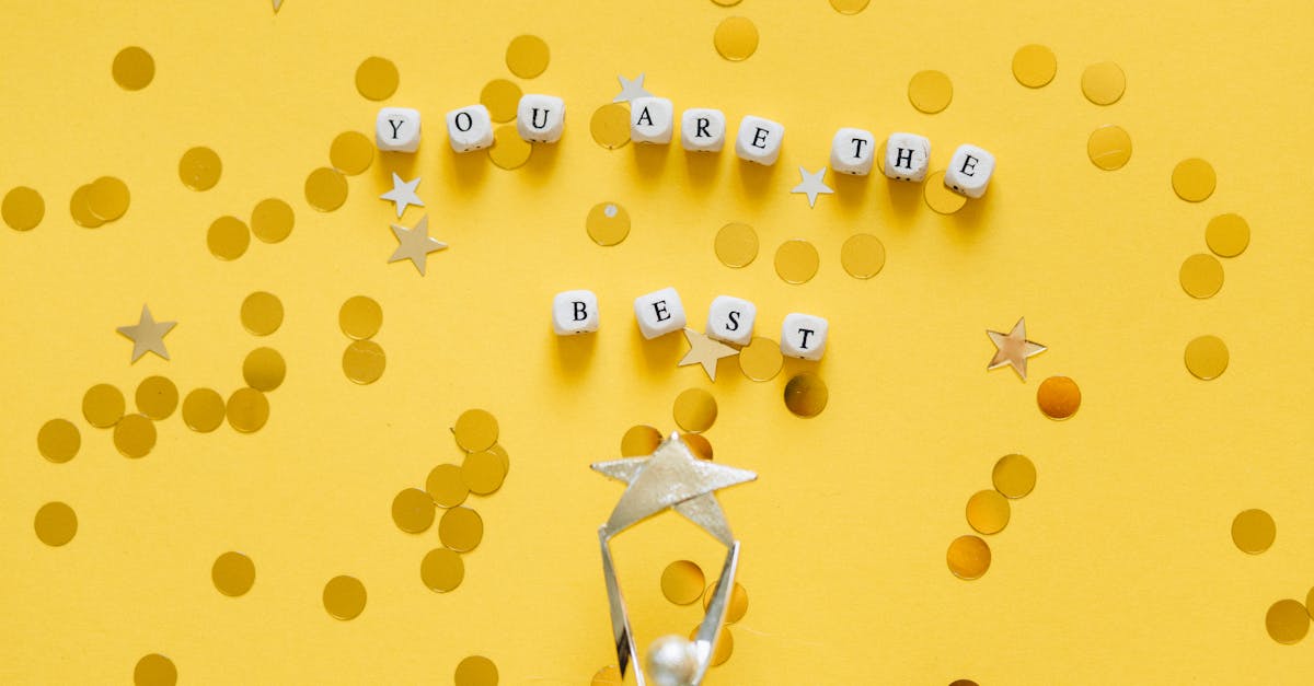 inspirational layout with you are the best message and star confetti on a golden background