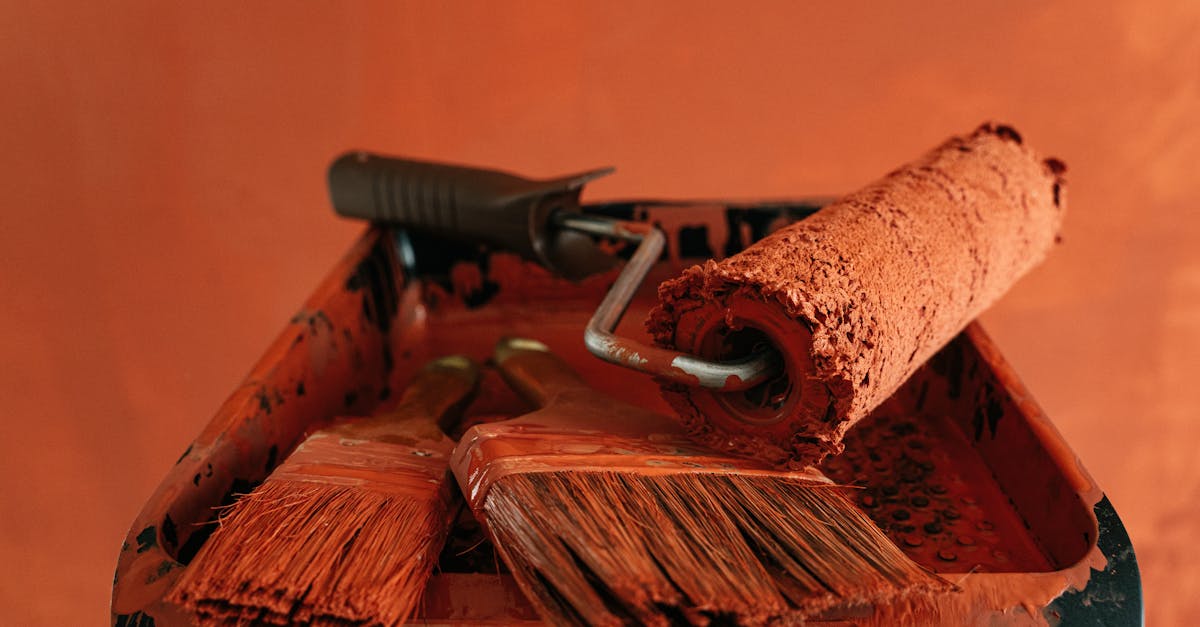 orange paint tools in a messy tray perfect for renovation themes